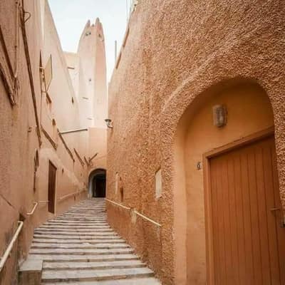 A stepped lane between ochre walls in a M'Zab ksar