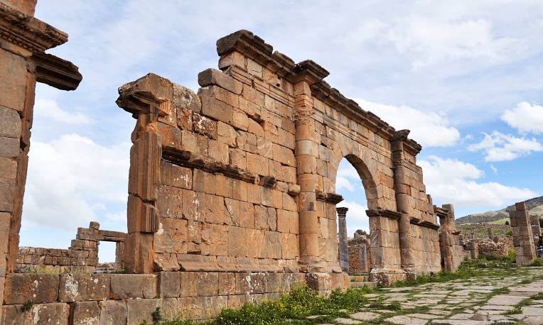 A tall arched wall of Roman masonry at Djémila